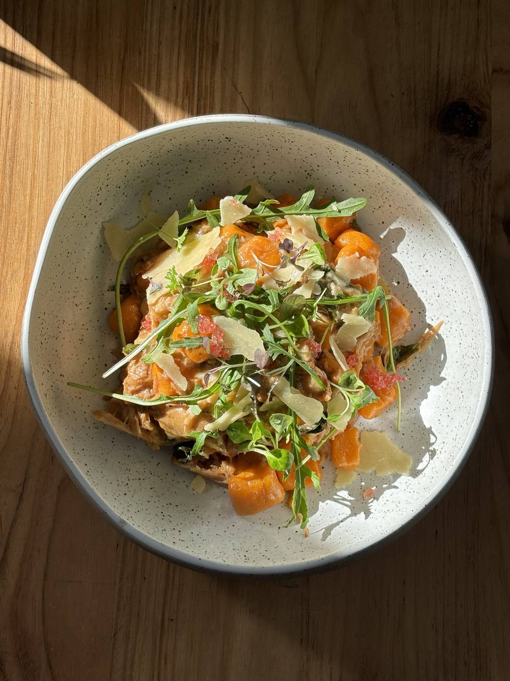 Pumpkin gnocchi with rocket and shaved parmesan