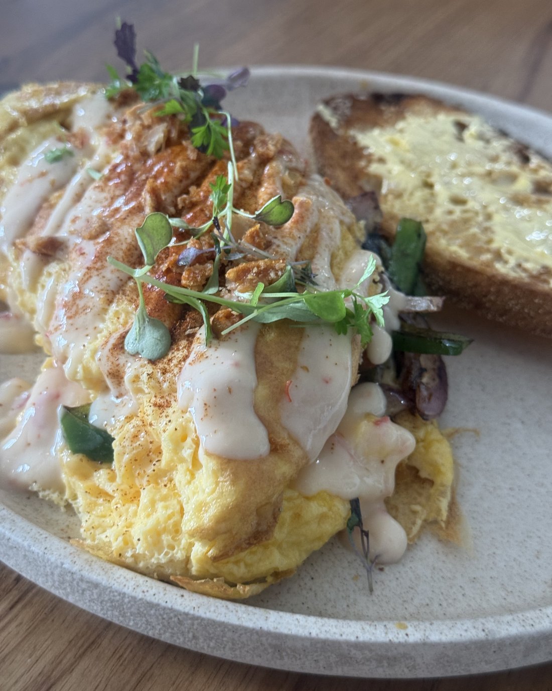 Fluffy omelette with herbs and toasted sourdough